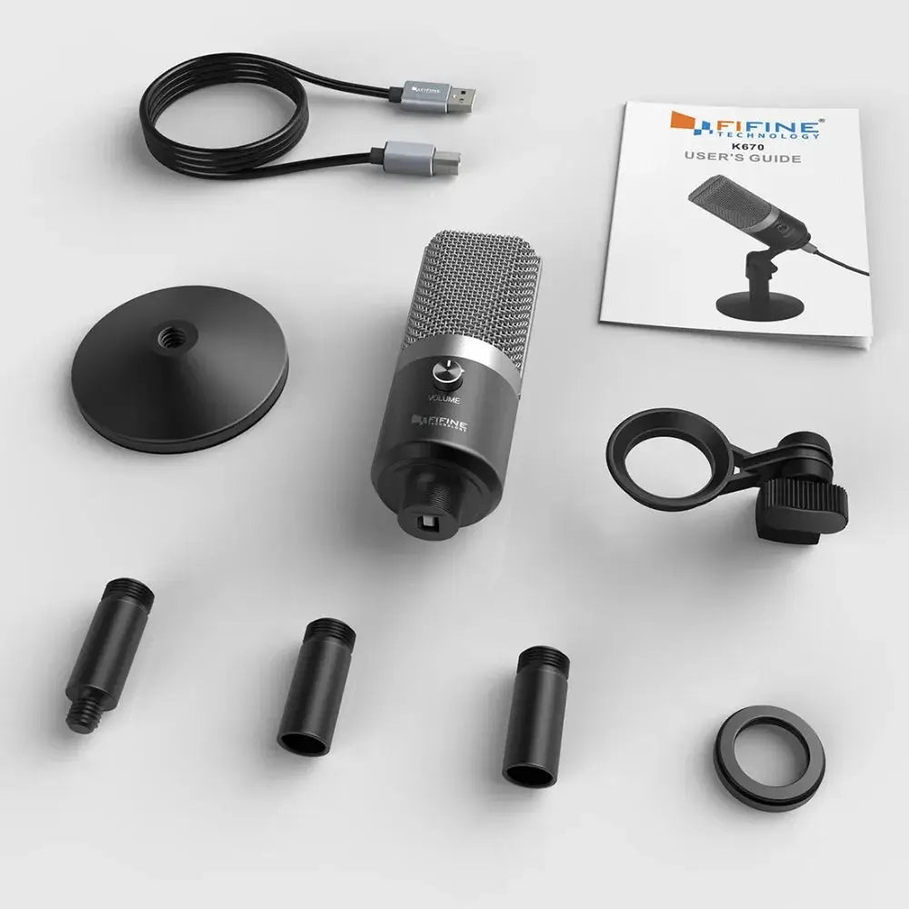 a microphone and other accessories on a white surface